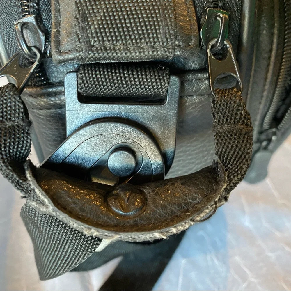 View Black Leather PaddedCamera Bag with Durable Construction and Compact Design